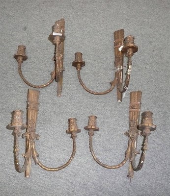 Lot 1091 - Set of four gilt Gesso twin branch wall lights and giltwood finials (in one box)