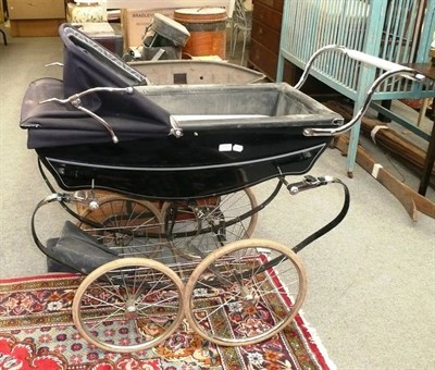 Lot 1111 - A silver cross pram