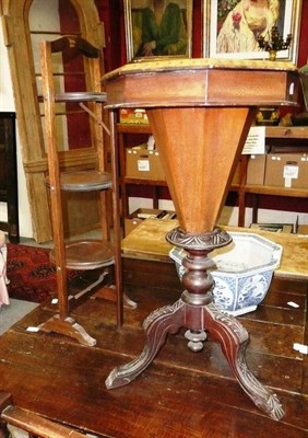 Lot 1129 - Walnut work table on pedestal base with inlaid games top and a three tier cake stand