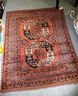 Lot 1132 - An Ersari rug Afghan Turkestan The field with 2 elephant foot guls enclosed by zig zag borders