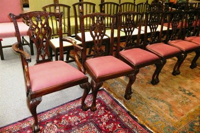 Lot 1136 - A set of fourteen Chippendale style chairs, comprising twelve singles and two carver chairs