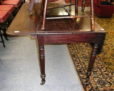 Lot 1140 - A mahogany Pembroke dining table