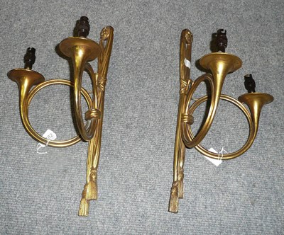 Lot 1182 - Pair of gilt metal twin branch wall lights