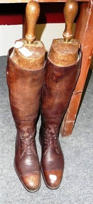 Lot 1190 - Pair of brown leather hunting boots and stretchers