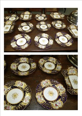 Lot 1214 - English porcelain gilt dessert service, painted with floral sprays