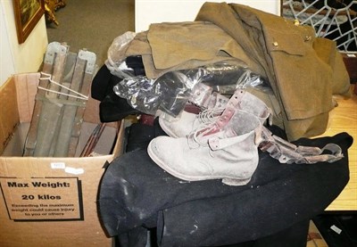 Lot 1223 - Suitcase, army uniforms, jacket, leather boots, belt and folding army bed etc