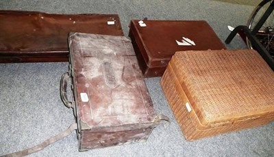 Lot 1225 - Leather gun case, wicker basket, small suitcase and a cartridge case