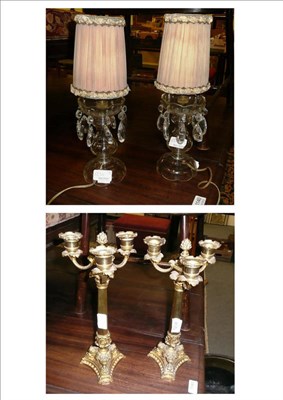 Lot 1234 - Pair of gilt metal three branch candelabra and a pair of table lamps with shades