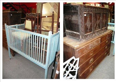 Lot 1245 - An oak press base, carved oak kist, child's painted cot, Edwardian chair, towel rail, mirror...