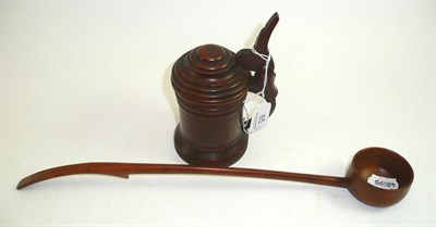 Lot 65 - A treen hinged tankard and ladle (2)
