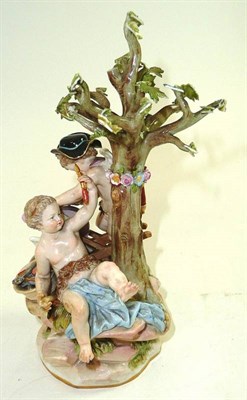 Lot 99 - Meissen group (damages) 'Cupid sharpening his arrows'