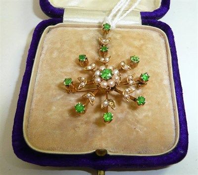 Lot 111 - A demantoid garnet and seed pearl brooch/pendant (one pearl missing)