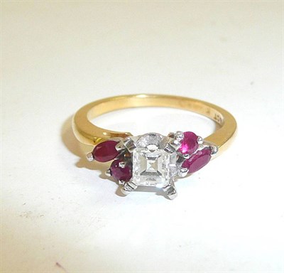 Lot 116 - A diamond and ruby set ring, stamped ";18ct"