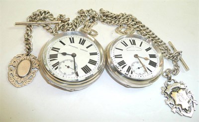 Lot 126 - Two silver open faced pocket watches, two silver watch chains and two attached silver medals