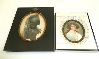 Lot 156 - Ivory key framed miniature portrait of a lady and a Framed portrait of a lady by Tunville