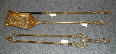 Lot 168 - A set of brass fire irons