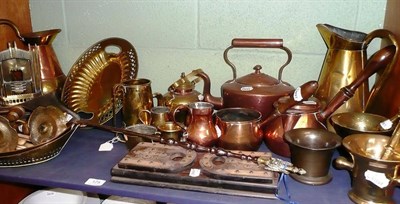 Lot 175 - A brass jug, a copper jug, two mortars and pestles, a brandy pan, another pestle, a brass and...