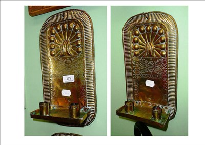 Lot 177 - A pair of brass sconces, dated