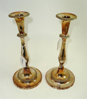 Lot 184 - A pair of Sheffield plate candlesticks