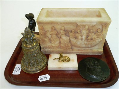 Lot 210 - Carved alabaster figural flower holder, brass bell, figure of a putti, gilt metal seated animal and