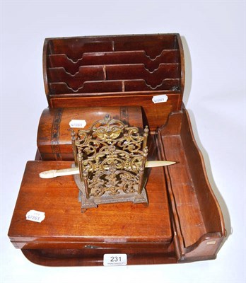 Lot 231 - A correspondence rack, a brass letter rack, a tea caddy and carved ivory letter opener etc