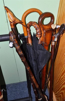 Lot 262 - A shooting stick, two parasols, a walking stick and four assorted walking canes