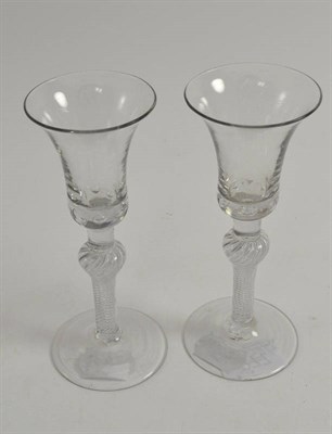 Lot 277 - A pair of spiral twist wine glasses