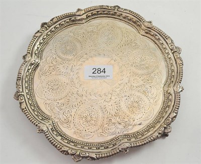 Lot 284 - A silver salver with bright cut decoration