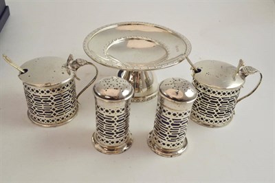 Lot 309 - Elkington silver riveted nut dish Sheffield 1906 and a pair of pierced mustard pots and pepperettes