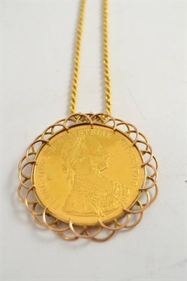 Lot 326 - An Austrian four ducat coin loose mounted as a pendant, with rope twist chain