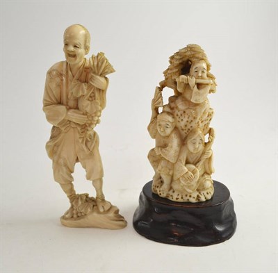 Lot 330 - Two carved ivory figures