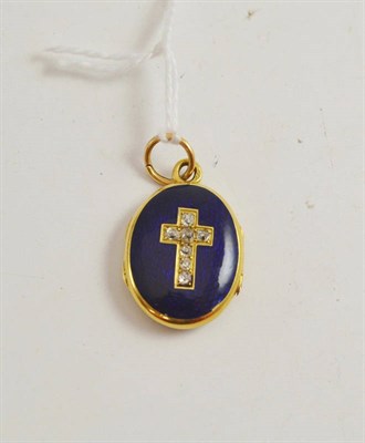 Lot 338 - Blue oval pendant with diamond cross and double OO's on reverse