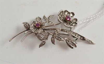 Lot 344 - A ruby and diamond floral spray brooch