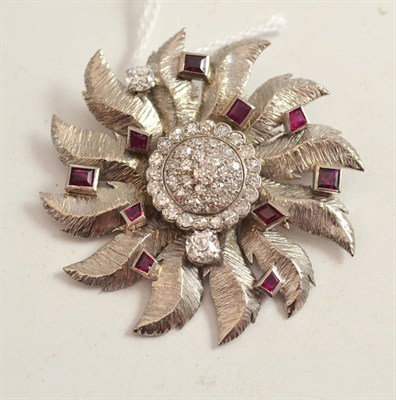 Lot 345 - A circular burst brooch, a central cluster of old cut and single-cut diamonds within a radial frame