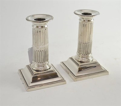 Lot 378 - A pair of silver desk candlesticks