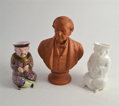 Lot 390 - Watcombe terracotta bust of Gladstone and two Copeland Mandarin cream jugs (3)