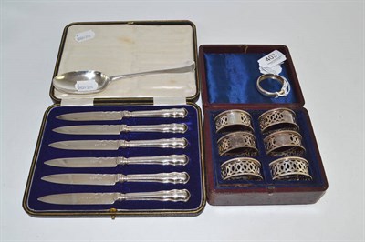 Lot 403 - Georgian silver spoons, silver napkin ring, cased set of six plated napkin rings, cased set of...