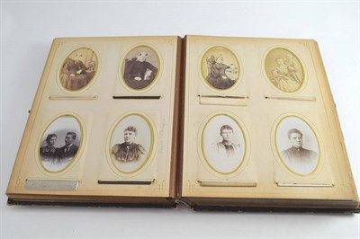 Lot 406 - One photograph album and two carte de viste albums