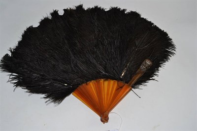 Lot 409 - A diamond set ostrich fan