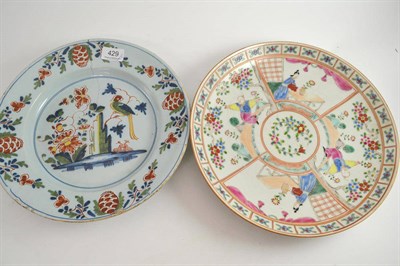 Lot 429 - An 18th century polychrome delft dish and a Chinese enamelled charger