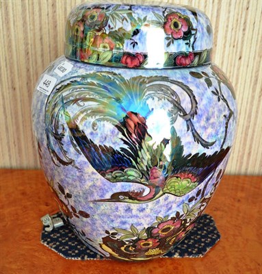 Lot 448 - Large 1920s lustred Phoenix pattern pottery jar with cover