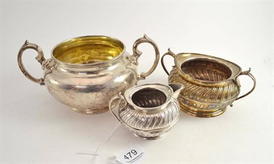 Lot 479 - Silver sugar basin, Edinburgh 1863 and a spirally fluted sugar basin and cream jug, Birmingham