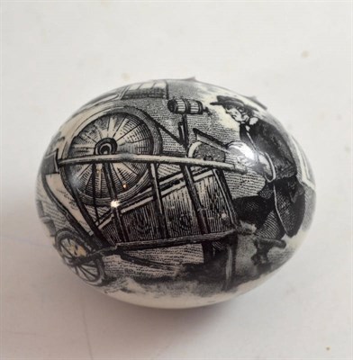 Lot 497 - A late 19th century Staffordshire pottery black printed Christening egg