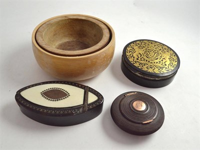 Lot 503 - Two tortoiseshell and brass inlaid boxes (damages), a treen turned hinged box and two treen bowls