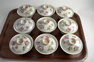 Lot 517 - Nine early 20th century Chinese famille rose bowls and cover