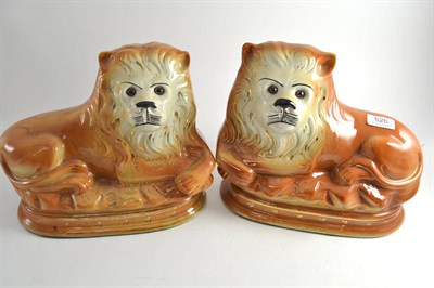 Lot 526 - Pair of Staffordshire Pottery lions with glass eyes