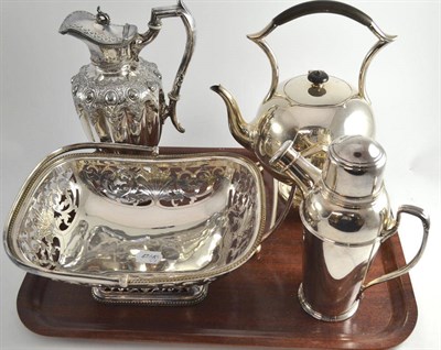 Lot 529 - A silver plated claret jug, a kettle on stand, a pierced basket with swing handle and a...