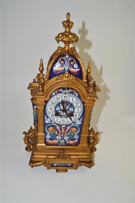 Lot 543 - A gilt and porcelain mantel clock (no pendulum)