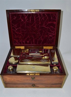 Lot 548 - A composite George IV and William IV silver gilt travelling dressing table set, Thomas...