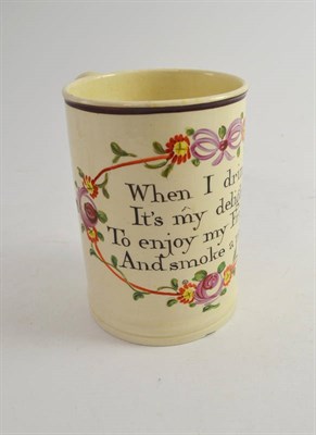 Lot 561 - A creamware Frog Mug, circa 1770, of cylindrical form, inscribed WHEN I DRINK ITS MY DELIGHT TO...